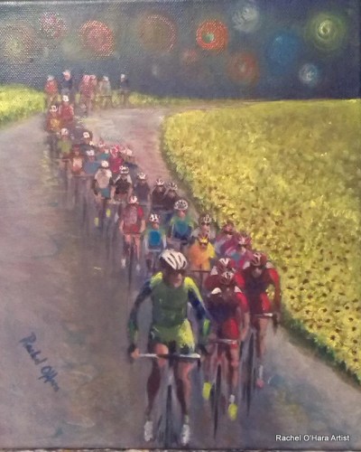 The peleton through the sunflowers